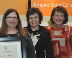 Karen Garner stands at left as the 2011 recipient of the Empire State College Foundation Susan H. Turben Award for Excellence in Scholarship. To Garner's right are 2010 recipient Nataly Tcherepashenets and Susan H. Turben