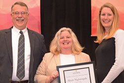 Heidi Nightengale, the 2015 recipient of the Empire State College Award for Excellence in Part-Time Mentoring, with President Merodie Hancock and Alan Stankiewicz, last year's recipient.