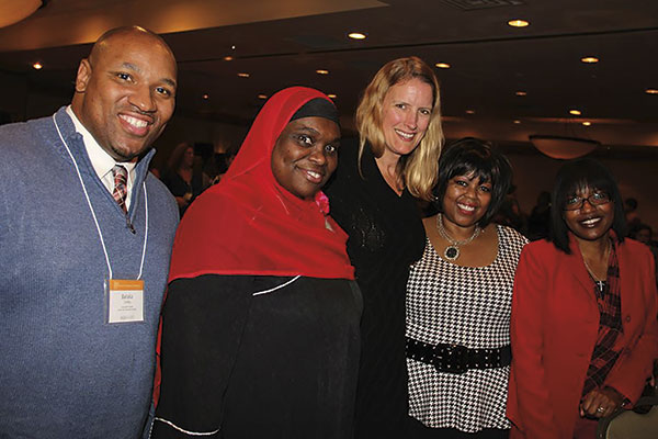 Members of Minority Students in Action stand with President Merodie Hancock at the annual Student Academic Conference. Second from left is Layla Abdullah-Poulos, founder 
of the MSiA club.
