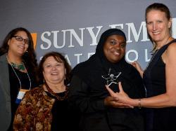 Left to right: Sandra Barkevich, Pat Myers, Layla Abdullah-Poulos and President Merodie Hancock