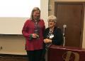 Meg Benke, left, is presented with the Noflett Williams Service Award by Deb Adair, executive director of Quality Matters, the 2016 award recipient. Photo provided NUTN