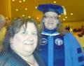 Student Kim Russell, left, attended the 2014 Albany commencement, with her friend and current graduate student Lori Mould ’14, seen in her regalia as the former SUNY student trustee.