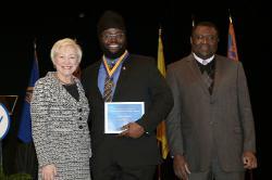 Chancellor Nancy Zimpher, at left, with Omar Richards, a 2016 Chancellor’s Award for Student Excellence recipient, and SUNY Empire State College Provost Alfred Ntoko at the presentation ceremony, which was held in Albany. Photo/SUNY