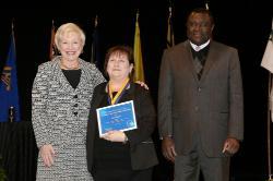 Chancellor Nancy Zimpher, at left, with Kim Russell, a 2016 Chancellor’s Award for Student Excellence recipient, and SUNY Empire State College Provost Alfred Ntoko at the presentation ceremony, which was held in Albany. Photo/SUNY