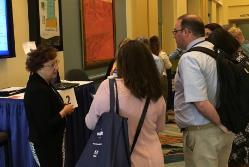 SUNY Empire Alumna Lydia Rhoades-Brown '88, '15, discusses her research with colleagues at the Online Learning Consortium’s OLC Accelerate 2016 Conference.