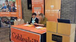 SUNY Cobleskill President Terenzio and SUNY Empire State College President Hancock sign an articulation agreement for business students.