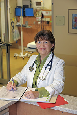 photo of a nurse with a logbook