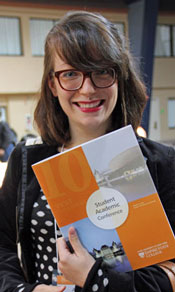 This photo of graduate student Alecia Eberhardt at the 2014 Student Academic Conference appeared on the college's homepage. Photo/Jamal Arabaty