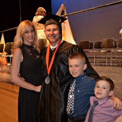 Robert Gouldsbury is joined by his wife, Marissa, and their two boys Robert, 9, and Shane, 6, right after commencement. Photo/Empire State College