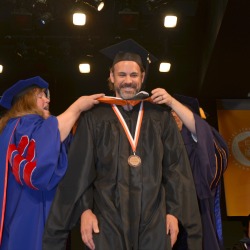 Matthew Krzyston receives the college's Dean's Medal for his outstanding academic achievements as a graduate student. Photo/Empire State College